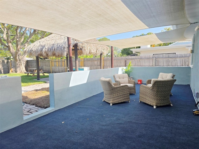 view of patio / terrace featuring a fenced backyard and outdoor lounge area