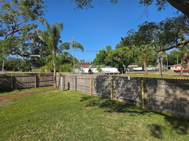 view of yard featuring fence