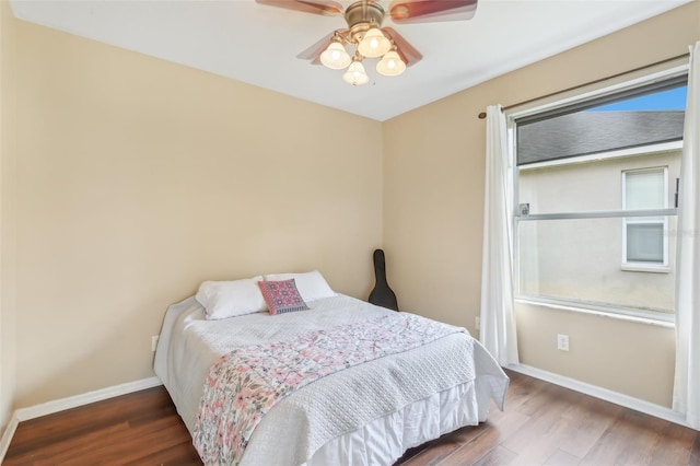 20254 Ravens End Dr, Tampa, FL 33647 - bedroom featuring baseboards, ceiling fan, and wood finished floors