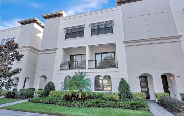 view of front of house featuring stucco siding