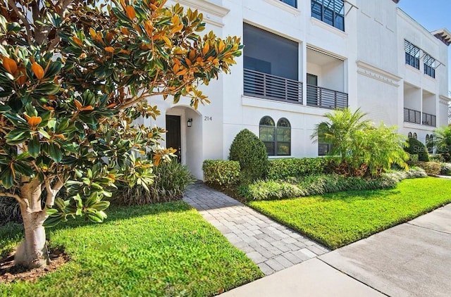 view of front of house featuring stucco siding