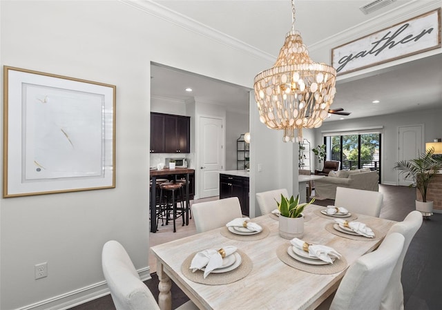 dining area with an inviting chandelier, crown molding, visible vents, baseboards, and recessed lighting