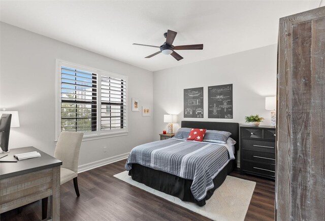 bedroom featuring baseboards, a ceiling fan, and wood finished floors