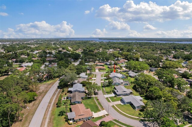 aerial view with a water view and a residential view