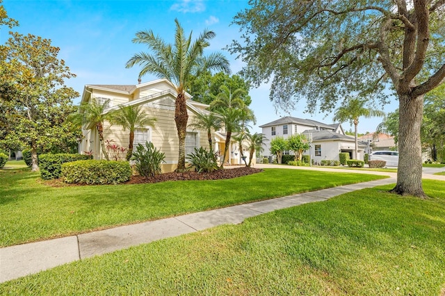 view of front of property with a front lawn