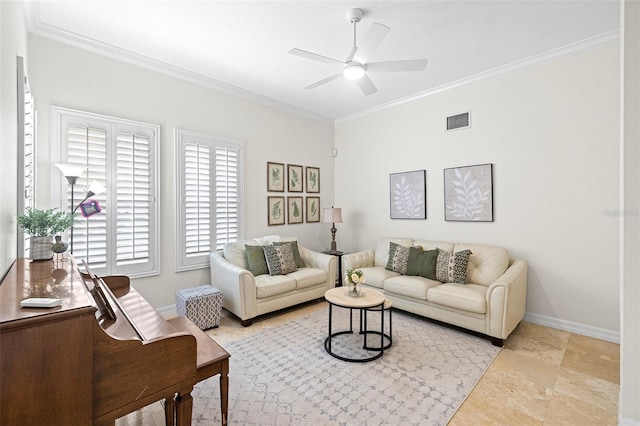 living room featuring crown molding, a ceiling fan, baseboards, and visible vents
