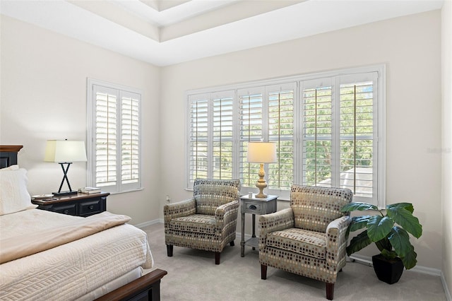 carpeted bedroom featuring baseboards