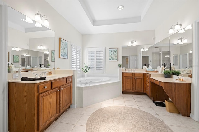 full bath featuring tile patterned flooring, a sink, and a bath