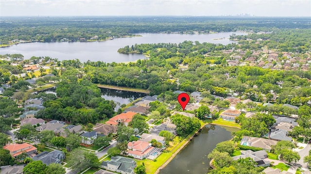 aerial view featuring a water view and a residential view