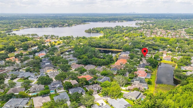 aerial view featuring a water view and a residential view