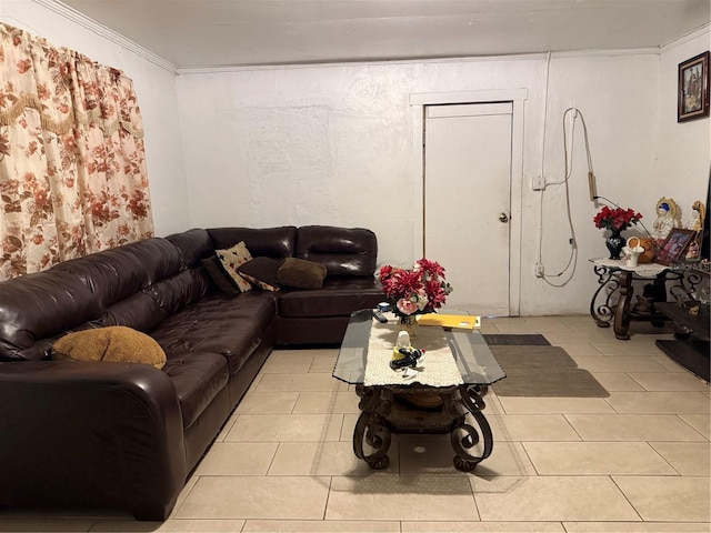 living room with crown molding and light tile patterned floors