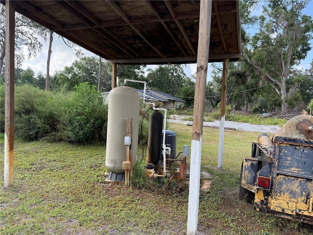 view of yard with a carport
