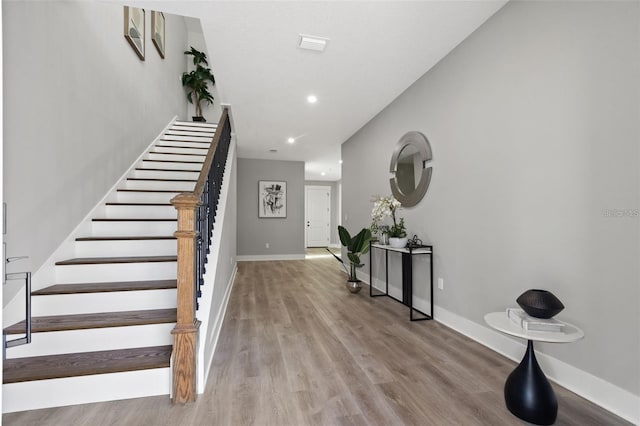 116 W Stanley St, Tampa, FL 33604 - entrance foyer with stairs, wood finished floors, baseboards, and recessed lighting