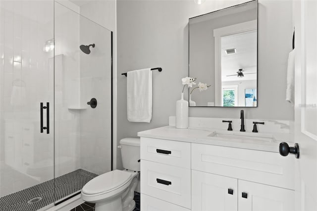 116 W Stanley St, Tampa, FL 33604 - full bathroom featuring a stall shower, toilet, ceiling fan, and vanity