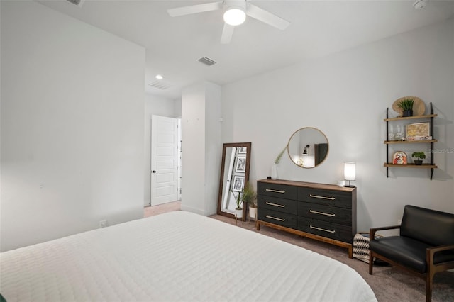 carpeted bedroom with a ceiling fan, baseboards, visible vents, and recessed lighting