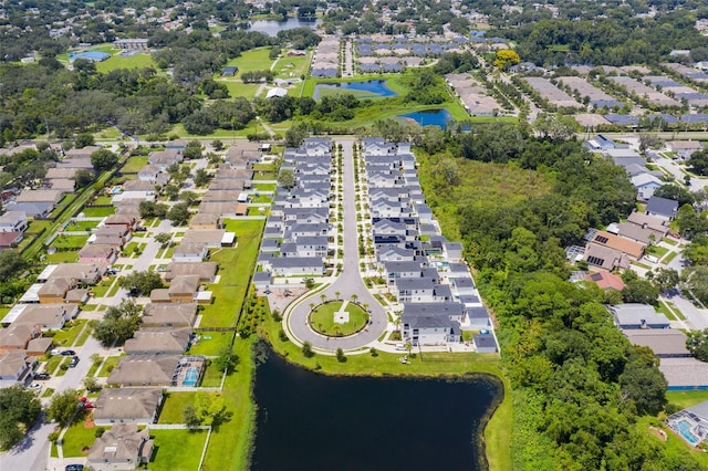 aerial view with a residential view and a water view