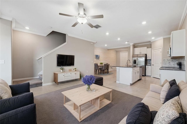 living area with ornamental molding, recessed lighting, and visible vents