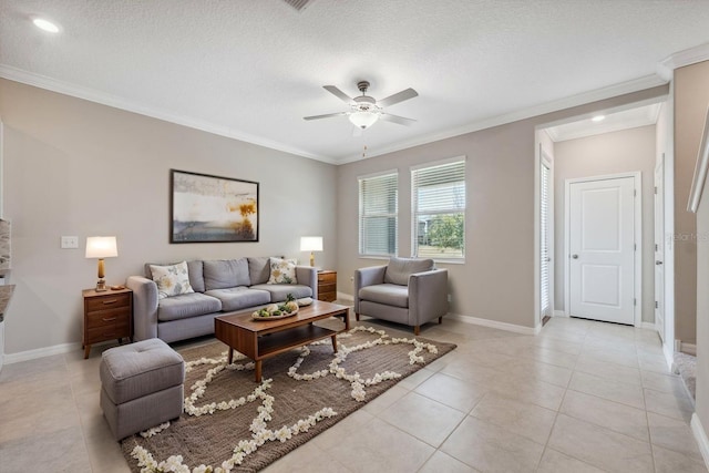 31970 Blue Passing Loop, Wesley Chapel, FL 33545 - living area with crown molding, ceiling fan, light tile patterned floors, baseboards, and a textured ceiling