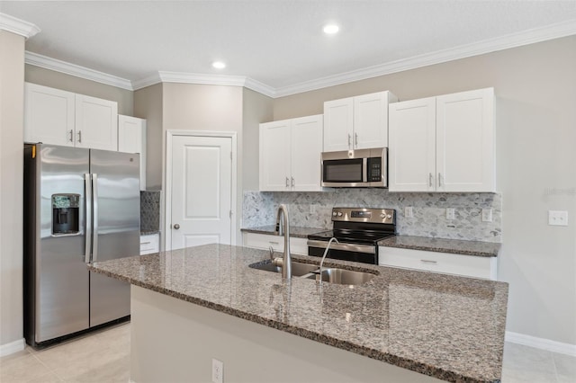 31970 Blue Passing Loop, Wesley Chapel, FL 33545 - kitchen with appliances with stainless steel finishes, a sink, white cabinetry, decorative backsplash, and crown molding