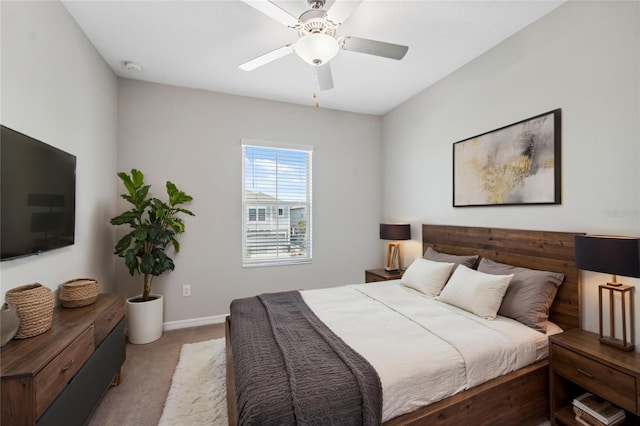 31970 Blue Passing Loop, Wesley Chapel, FL 33545 - carpeted bedroom with a ceiling fan and baseboards