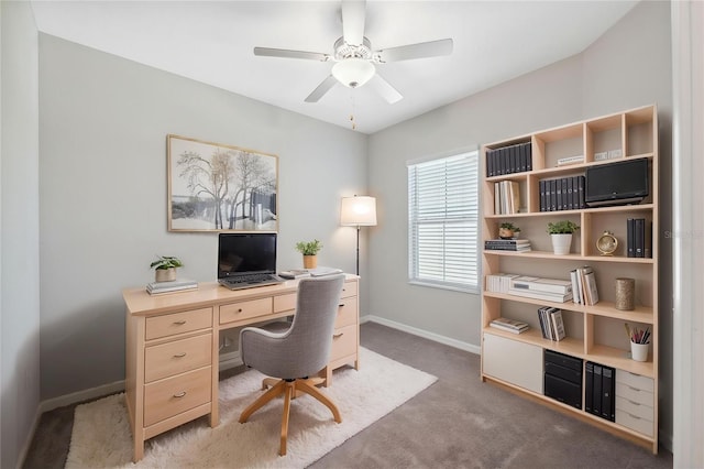 31970 Blue Passing Loop, Wesley Chapel, FL 33545 - home office featuring baseboards, light carpet, and a ceiling fan