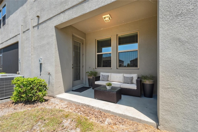 31970 Blue Passing Loop, Wesley Chapel, FL 33545 - view of patio featuring cooling unit and outdoor lounge area