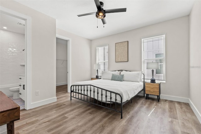 121 E Warren Ave Unit 1, Tampa, FL 33602 - bedroom with wood finished floors and baseboards