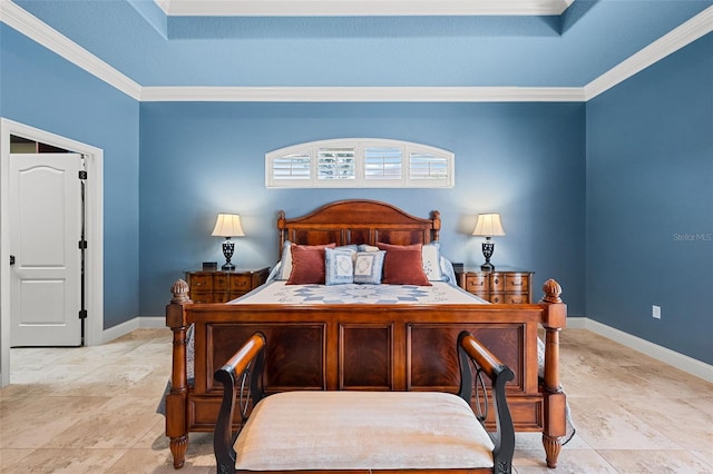 bedroom with crown molding, baseboards, and a tray ceiling