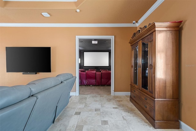 living room with baseboards, ornamental molding, and stone finish flooring