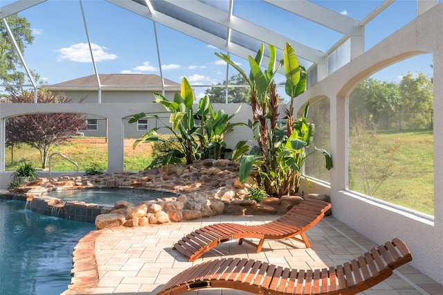 sunroom with a jacuzzi