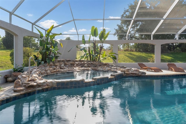 view of swimming pool featuring glass enclosure, a pool with connected hot tub, and a patio area
