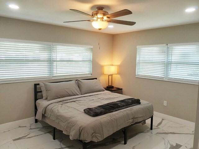 2042 Craft Ln, Sarasota, FL 34239 - bedroom with recessed lighting, baseboards, a ceiling fan, and marble finish floor