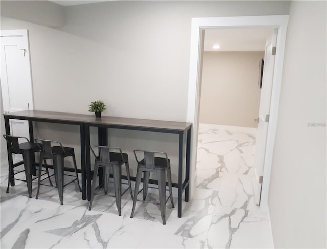 2042 Craft Ln, Sarasota, FL 34239 - dining space featuring recessed lighting, baseboards, and marble finish floor