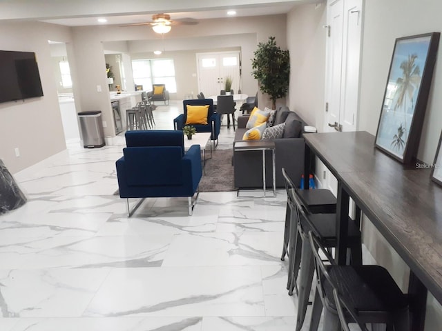 2042 Craft Ln, Sarasota, FL 34239 - living room with recessed lighting, a ceiling fan, and marble finish floor
