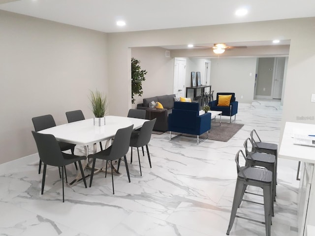 2042 Craft Ln, Sarasota, FL 34239 - dining room with recessed lighting, baseboards, and marble finish floor