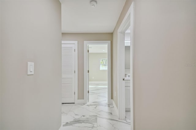2042 Craft Ln, Sarasota, FL 34239 - hallway with baseboards and marble finish floor