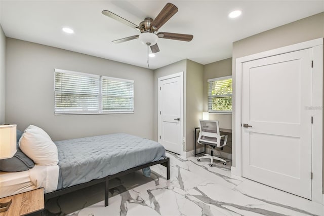 2042 Craft Ln, Sarasota, FL 34239 - bedroom featuring recessed lighting, ceiling fan, baseboards, and marble finish floor
