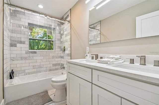 2042 Craft Ln, Sarasota, FL 34239 - bathroom with a sink, shower / bathtub combination, toilet, and double vanity