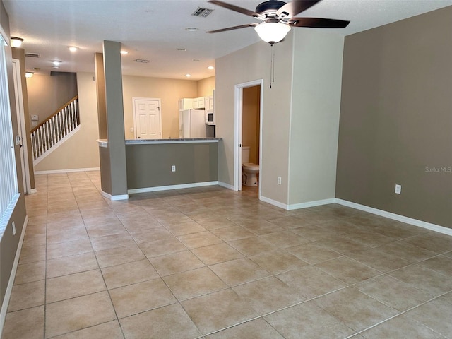 interior space with visible vents, stairs, recessed lighting, a ceiling fan, and light tile patterned floors