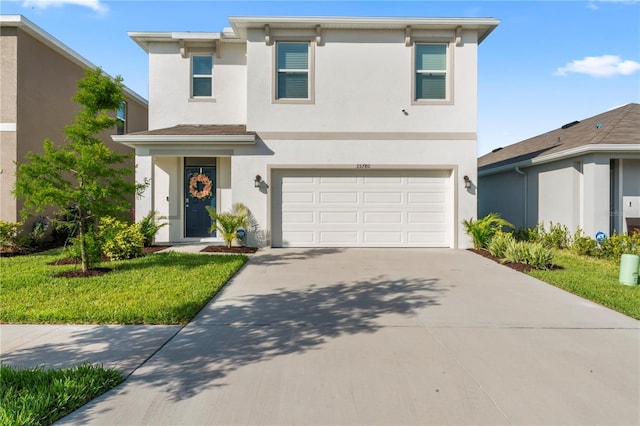 35780 Sunflower Hill Dr, Zephyrhills, FL 33541 - traditional-style house featuring a garage, a front lawn, stucco siding, and concrete driveway