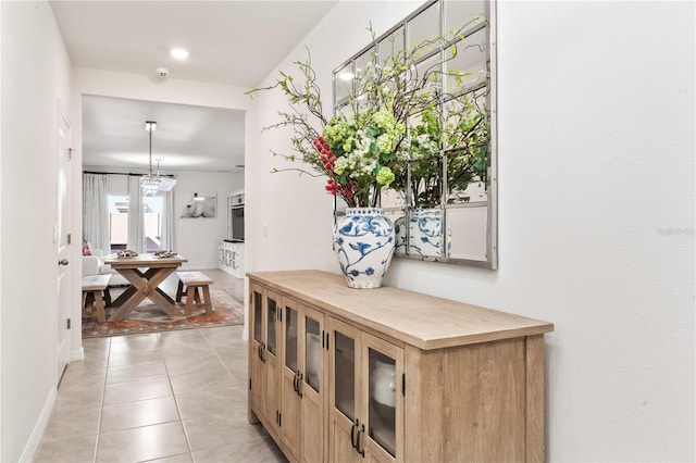 35780 Sunflower Hill Dr, Zephyrhills, FL 33541 - hall featuring light tile patterned floors and baseboards