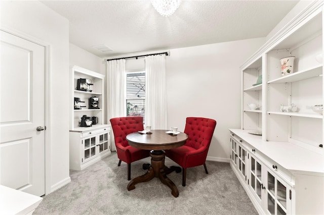35780 Sunflower Hill Dr, Zephyrhills, FL 33541 - dining room with baseboards and light carpet