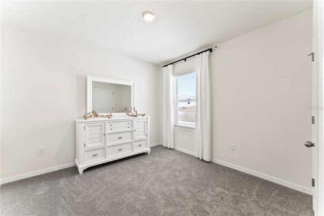 35780 Sunflower Hill Dr, Zephyrhills, FL 33541 - carpeted bedroom with baseboards
