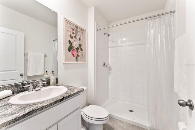 35780 Sunflower Hill Dr, Zephyrhills, FL 33541 - bathroom with vanity, a tile shower, and toilet