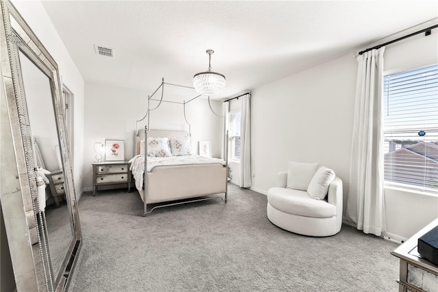 35780 Sunflower Hill Dr, Zephyrhills, FL 33541 - bedroom with visible vents, baseboards, and carpet floors