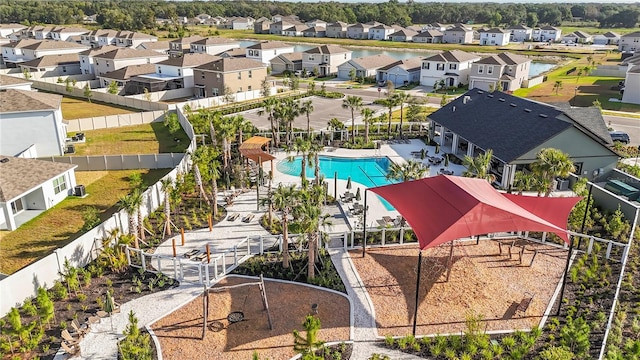 35780 Sunflower Hill Dr, Zephyrhills, FL 33541 - view of pool featuring fence and a residential view