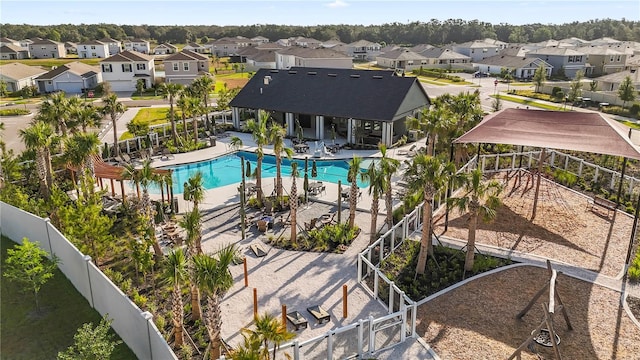 35780 Sunflower Hill Dr, Zephyrhills, FL 33541 - pool featuring a residential view, a patio, and a fenced backyard