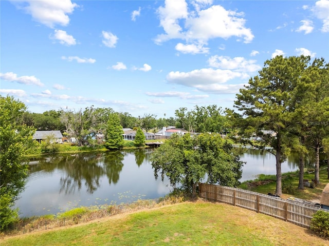 view of water feature with fence
