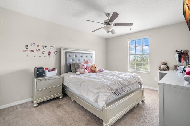 6708 Hazelnut Spice Dr, Ruskin, FL 33573 - bedroom featuring baseboards, ceiling fan, and light colored carpet