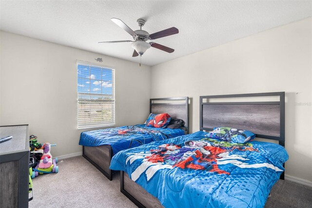 6708 Hazelnut Spice Dr, Ruskin, FL 33573 - carpeted bedroom featuring baseboards and ceiling fan